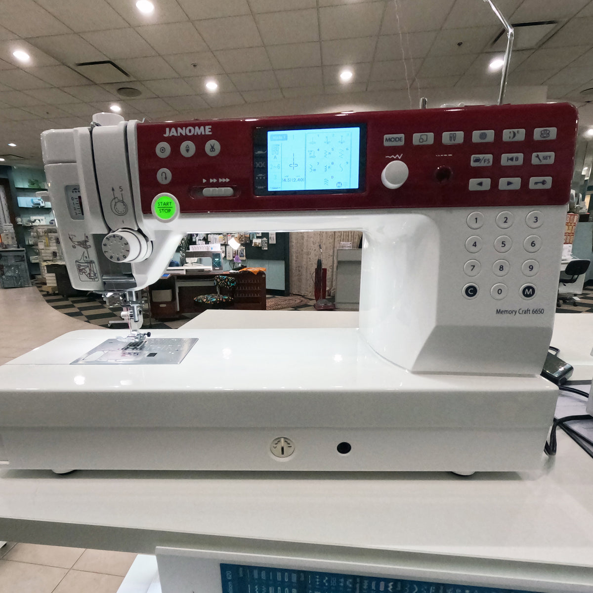 Janome Memory Craft 6650 Sewing & Embroidery Machine